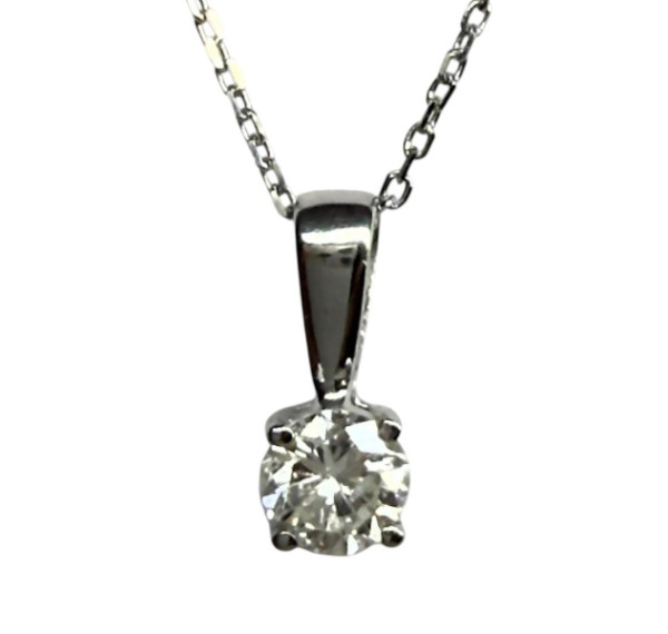 Conjunto de Solitario, Pendientes  y Colgante 1,40cts